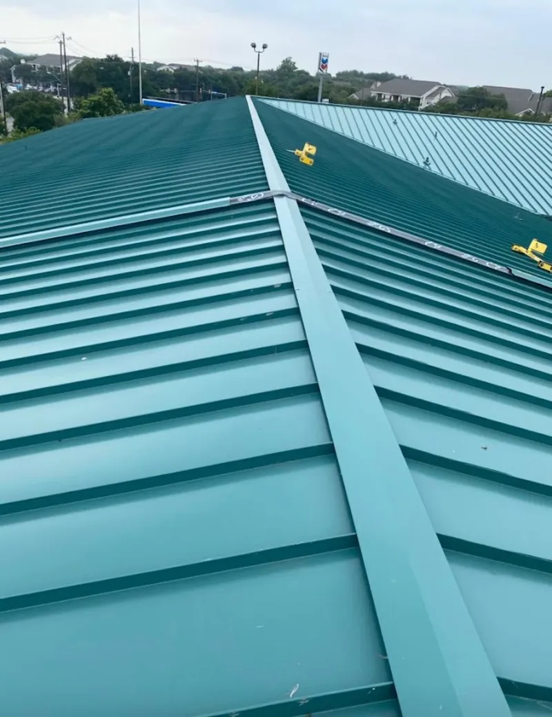 Green commercial metal roof ridge and valley for Metal Roof Repair in Security-Widefield